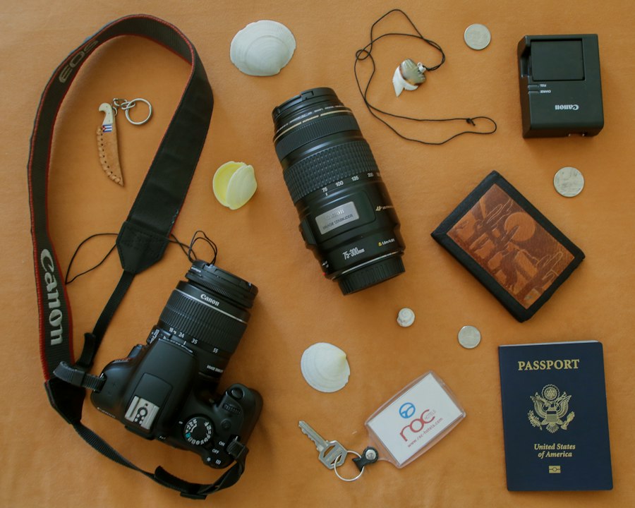 Camera, zoom lens and passport ready for the trip
