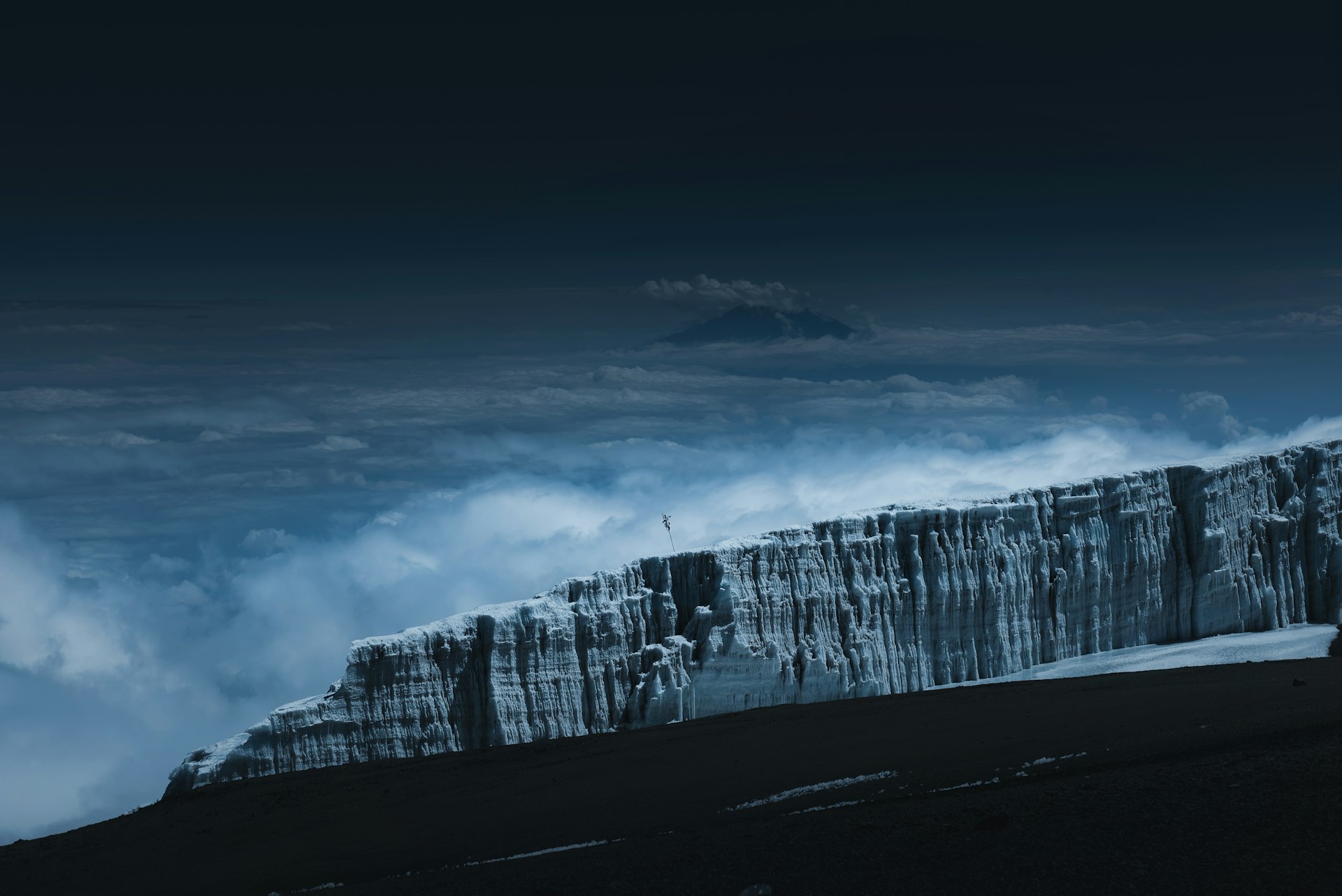 Kilimanjaro’s summit glaciers standing above a sea of cloud